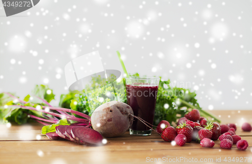 Image of glass of beetroot juice, fruits and vegetables