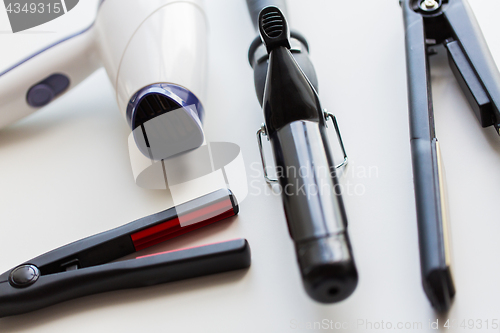 Image of hairdryer, hot styling and curling irons