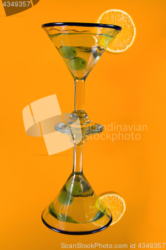 Image of Martini Glass on a Mirror