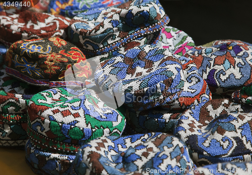 Image of The traditional Uzbek cap, named tubeteika, on a market