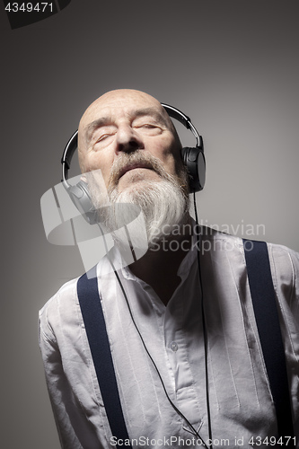 Image of elderly male portrait with headphones