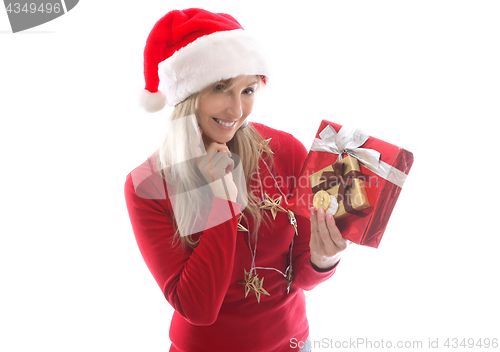 Image of Woman holding crypto currency and presents