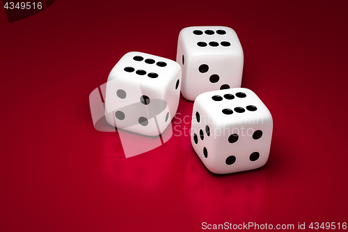 Image of three white dice on a red background