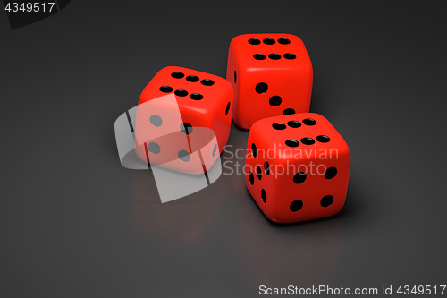 Image of three red dice on a gray background