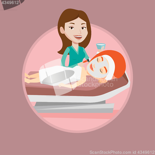 Image of Woman in beauty salon during cosmetology procedure