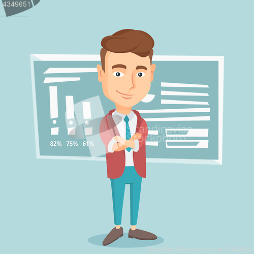 Image of Teacher or student standing in front of chalkboard