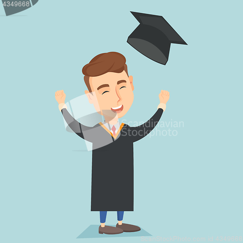 Image of Graduate throwing up graduation hat.