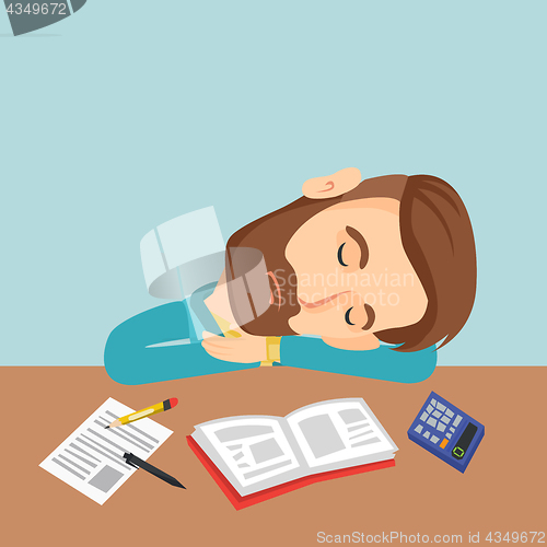 Image of Student sleeping at the desk with book.