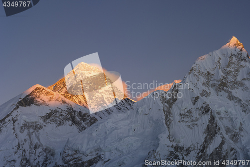 Image of Everest and Nuptse summits at sunset or sunrise