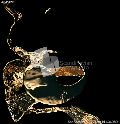 Image of Melted gold or oil splashes isolated on black