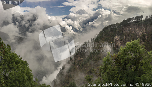 Image of Nilgiri summit and cloudy Himalayas
