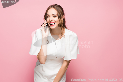 Image of Happy woman phone talking. Face with toothy smile