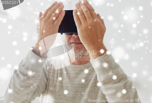 Image of old man in virtual reality headset or 3d glasses