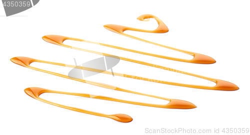 Image of caramel sauce on white background