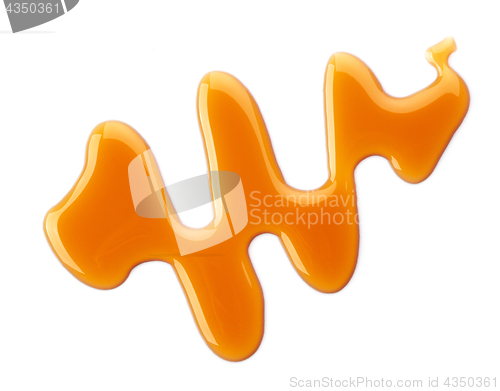 Image of caramel sauce on white background