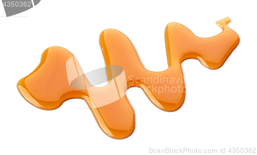 Image of caramel sauce on white background