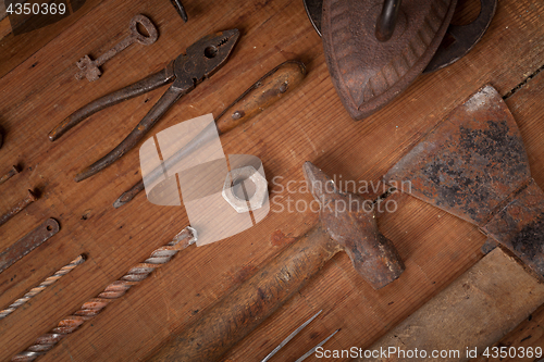 Image of Collection of vintage tools on wooden background