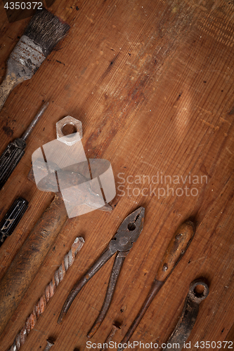 Image of Collection of vintage tools on wooden background