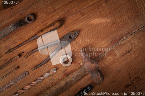 Image of Collection of vintage tools on wooden background
