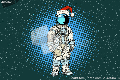 Image of Christmas lone astronaut in the Santa hat