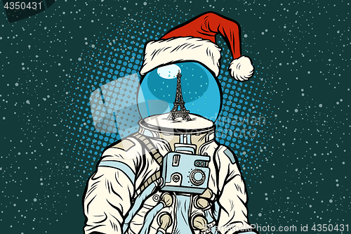 Image of Christmas astronaut with dreams of Paris