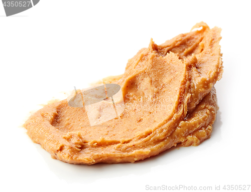 Image of peanut butter on white background