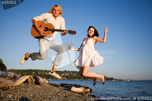 Image of Jumping couple in happiness