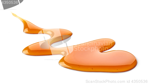 Image of caramel sauce on white background