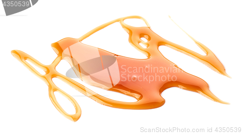 Image of caramel sauce on white background