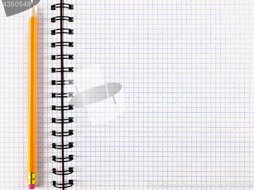 Image of notepad notebook with pencil 