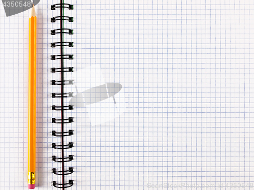Image of notepad notebook with pencil 