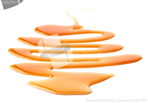 Image of caramel sauce on white background