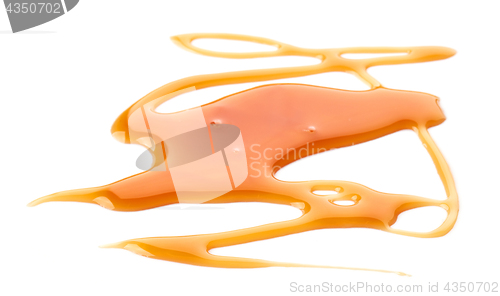 Image of caramel sauce on white background