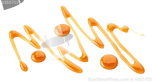 Image of caramel sauce on white background