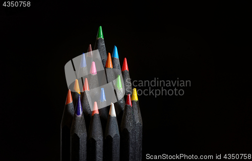 Image of Christmas tree made of wooden pencils