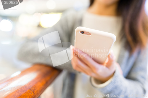 Image of Woman use of cellphone