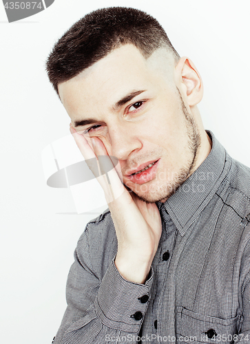 Image of young handsome teenage hipster guy posing emotional, happy smiling against white background isolated, lifestyle people concept