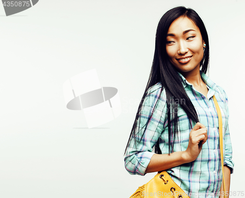 Image of young pretty asian woman posing cheerful emotional isolated on w