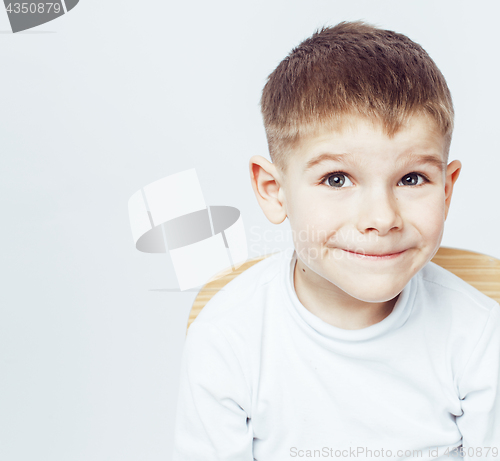 Image of little cute adorable boy posing gesturing cheerful on white background, lifestyle people concept