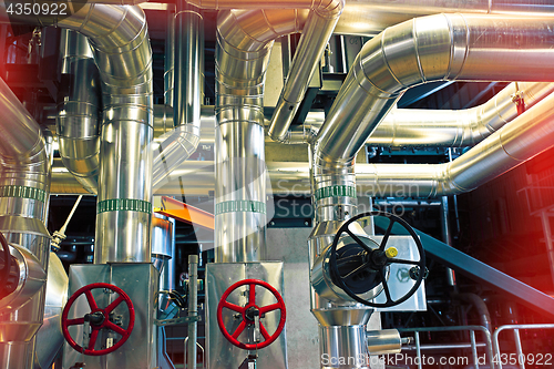 Image of Equipment, cables and piping as found inside of a modern industr