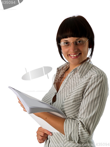 Image of Young businesswoman with papers