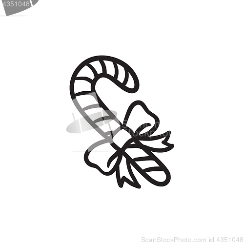 Image of Candy cane with christmas decoration sketch icon.
