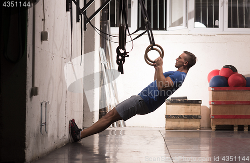 Image of man doing dipping exercise