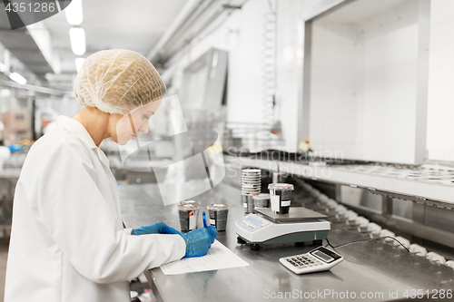 Image of woman working at ice cream factory