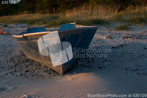 Image of Stranded old boat at the beach