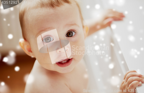 Image of face of happy little baby boy or girl