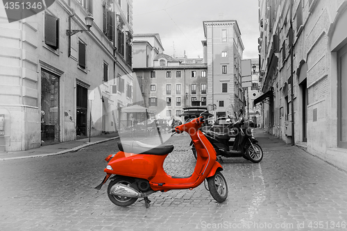 Image of Small red motorbike 