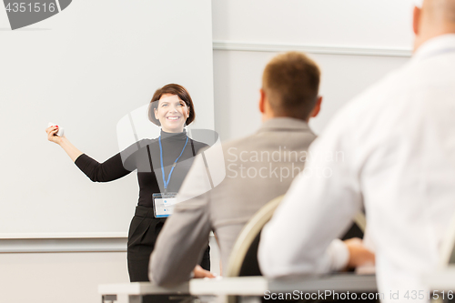 Image of group of people at business conference or lecture