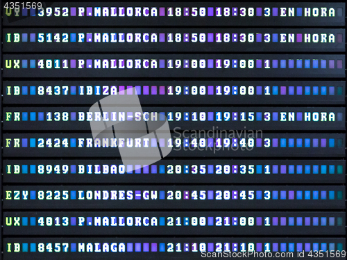 Image of Airport departures board.