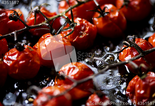 Image of Small red oven-baked tomatoes